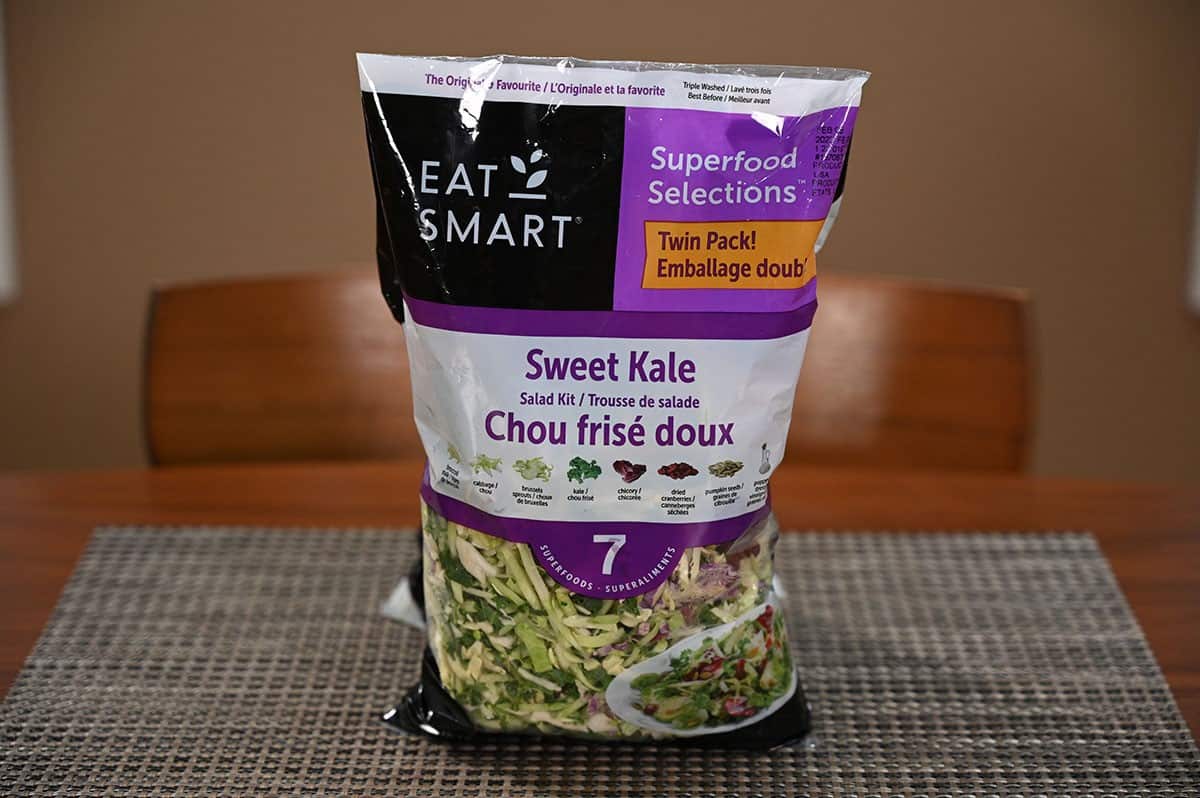 Costco Eat Smart Sweet Kale Salad Kit bag sitting on a table. 