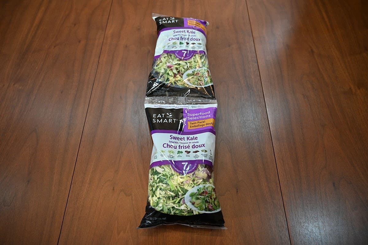 Costco Eat Smart Sweet Kale Salad Kit two pack on a wooden table. 