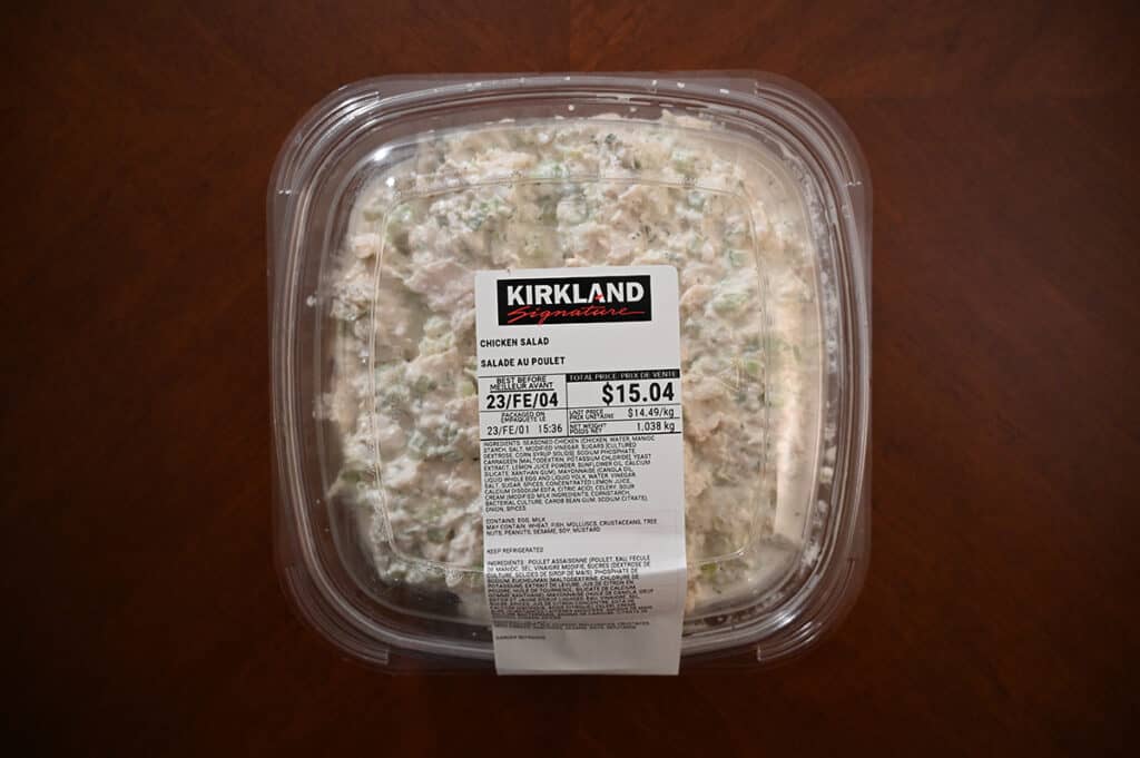 Image of a container of the Costco Kirkland Signature Chicken Salad container sitting on a table.