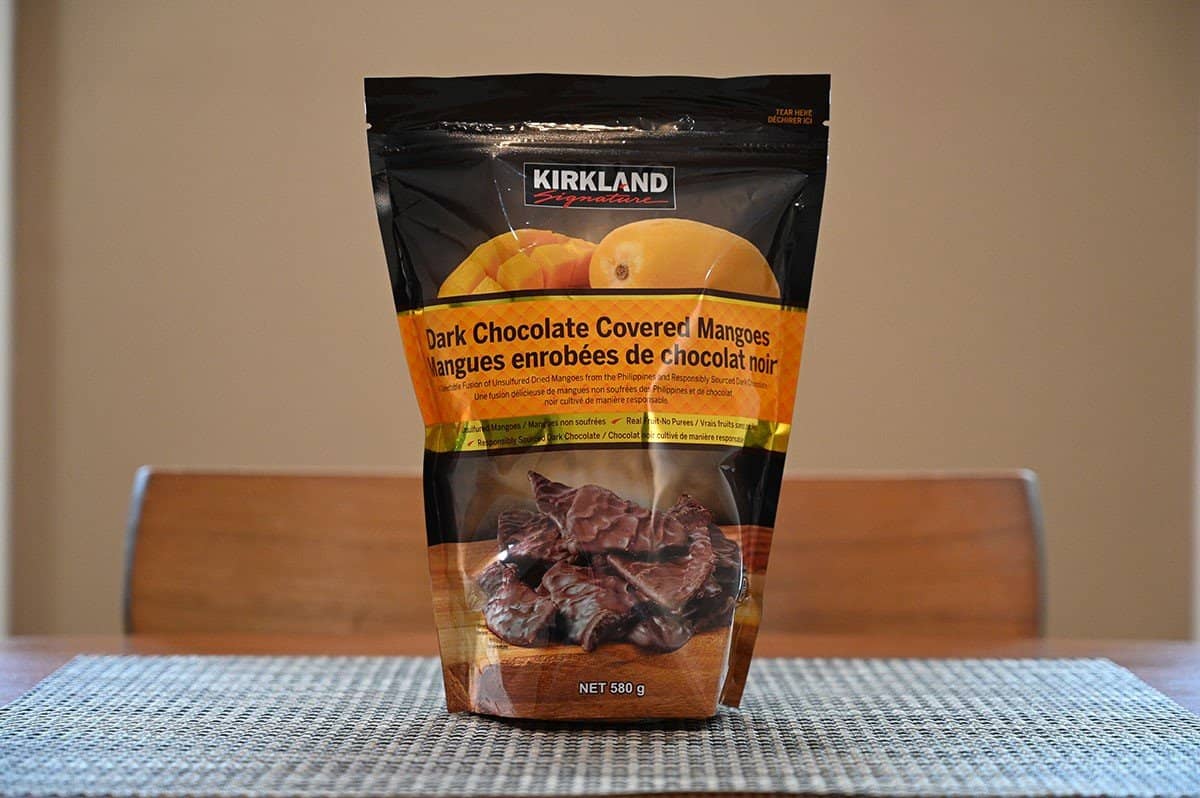 Image of the Costco Kirkland Dark Chocolate Mangoes bag on a table. 