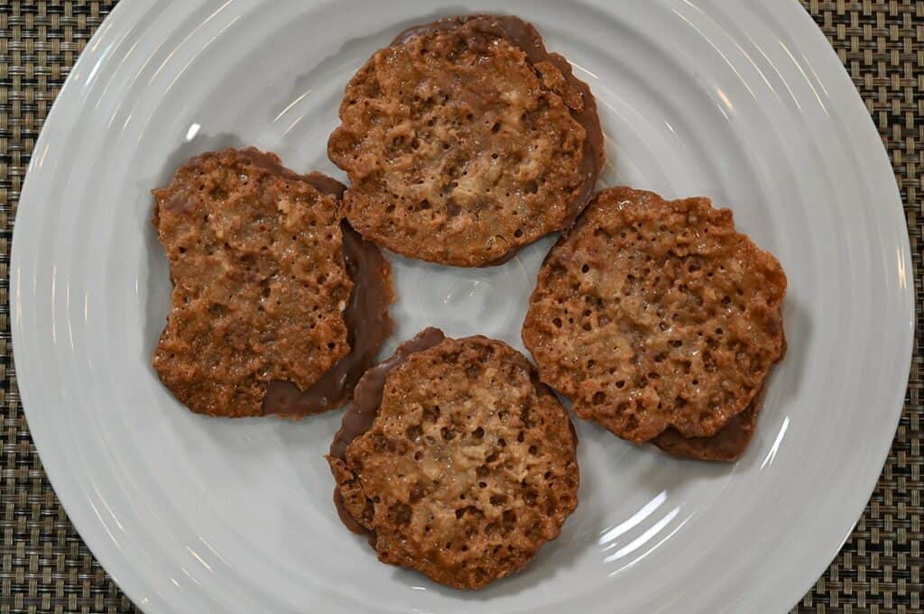 Image of Costco Desserts on Us Laceys  Macadamia Milk Chocolate Cookies on a plate
