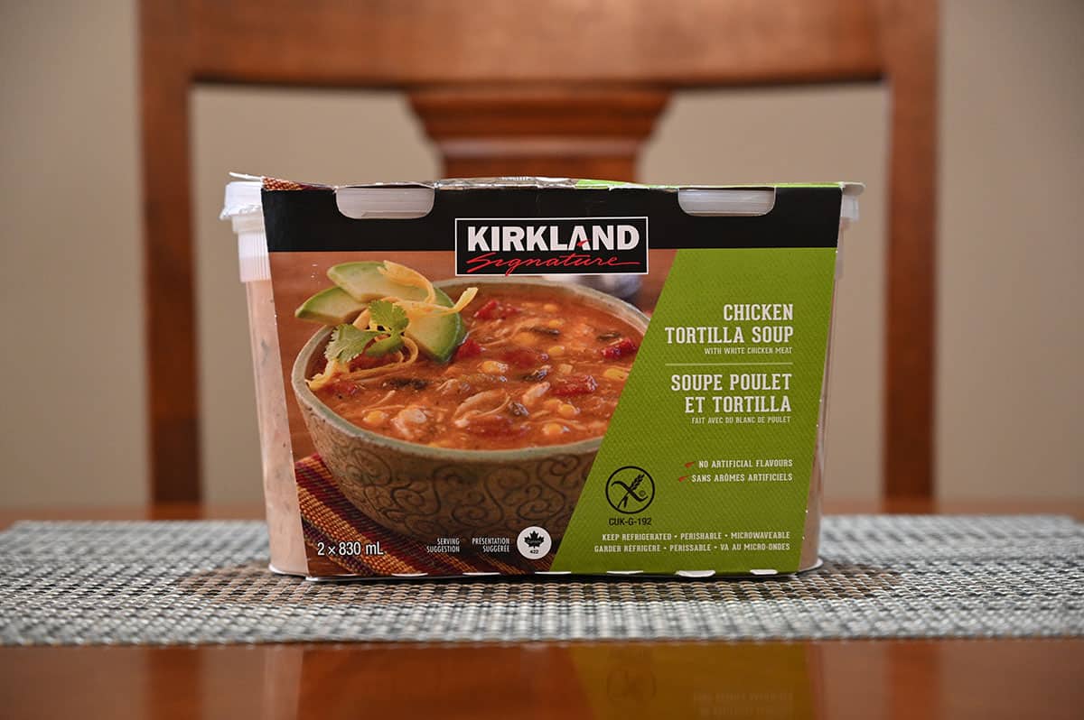 Side view image of the two pack of the Costco Kirkland Signature Chicken Tortilla Soup sitting on a table.