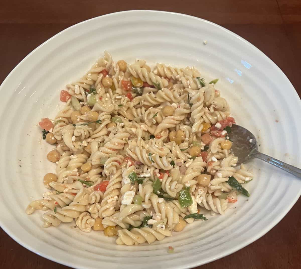 Image of a bowl of pasta salad. 