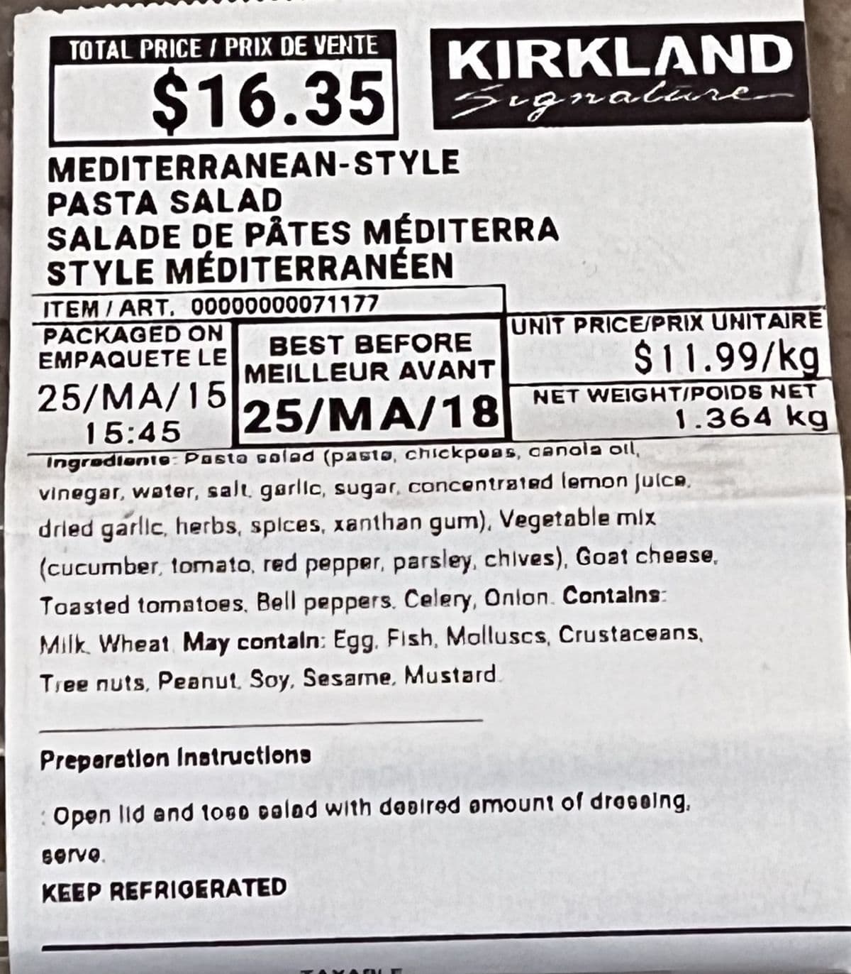 Closeup image of the front label on the pasta salad showing ingredients, best before date and cost.