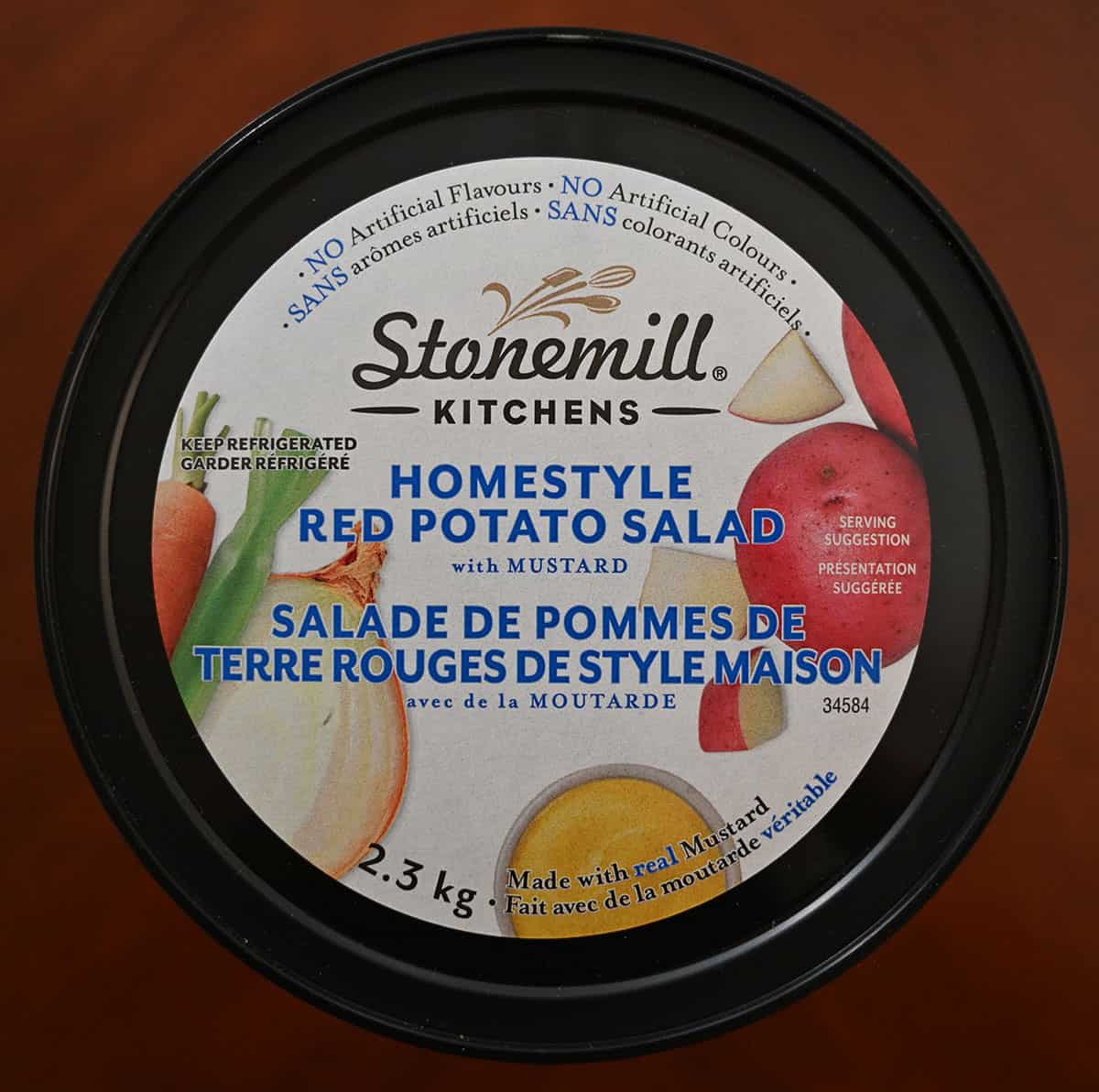 Image of the lid of the Costco Stonemill Kitchens Homestyle Red Potato Salad showing that it has no artificial colours or flavours.