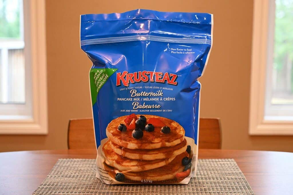 Costco Krusteaz Buttermilk Pancake Mix  bag sitting on a table, side view image. 