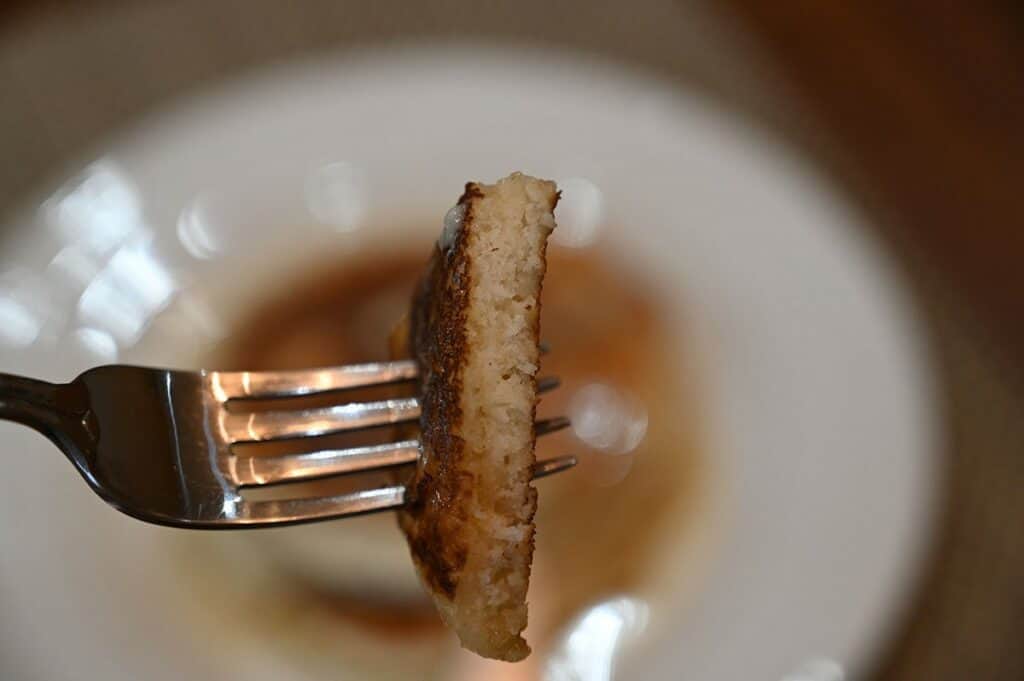 Close up image of a bite of prepared pancake using the Costco Krusteaz Buttermilk Pancake Mix. 