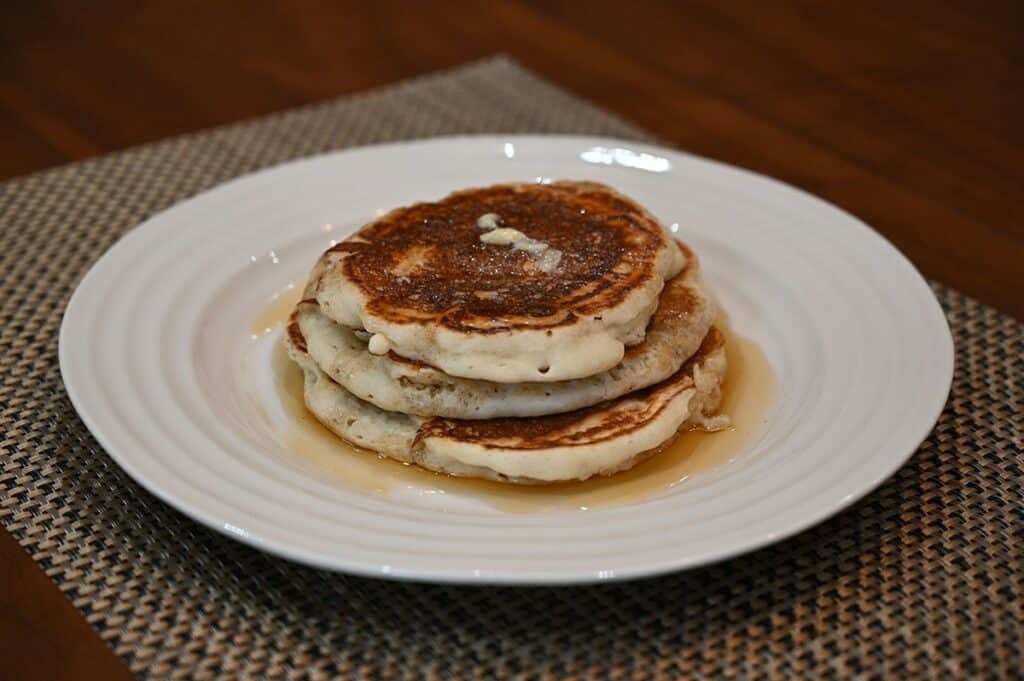 Costco Krusteaz Buttermilk Pancake Mix  stack of prepared pancakes on a plate with syrup.  