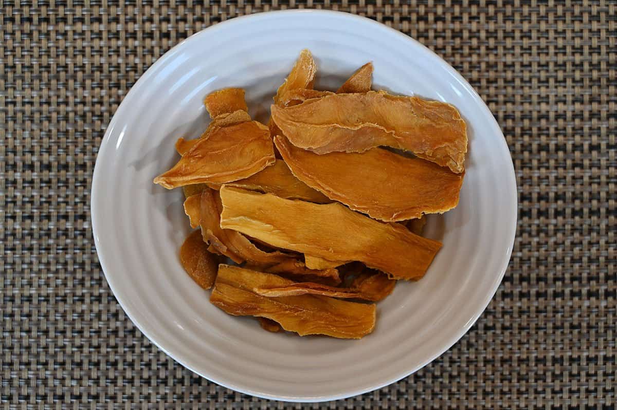 Bowl of Costco Kirkland Signature Organic Dried Mangoes. 