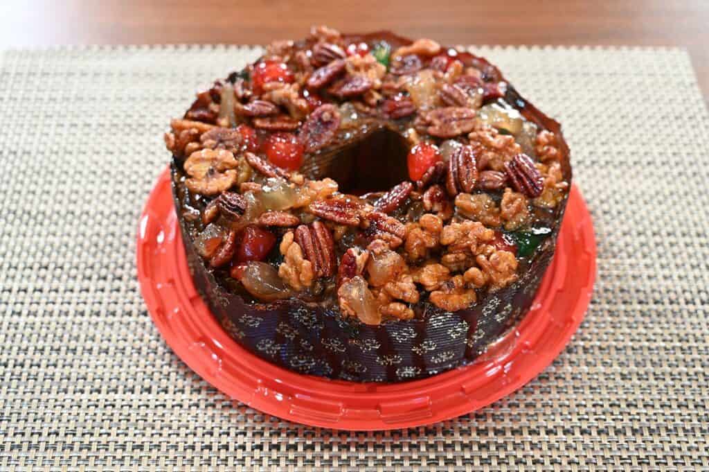 Close up image of the entire Costco Kirkland Signature Christmas Fruit Cake without the lid on 