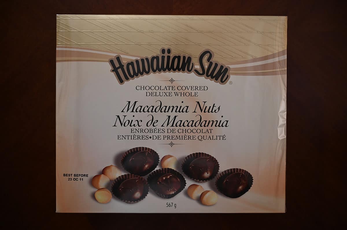 Costco Hawaiian Sun Chocolate Covered Macadamia Nuts box sitting on a table, top down image.