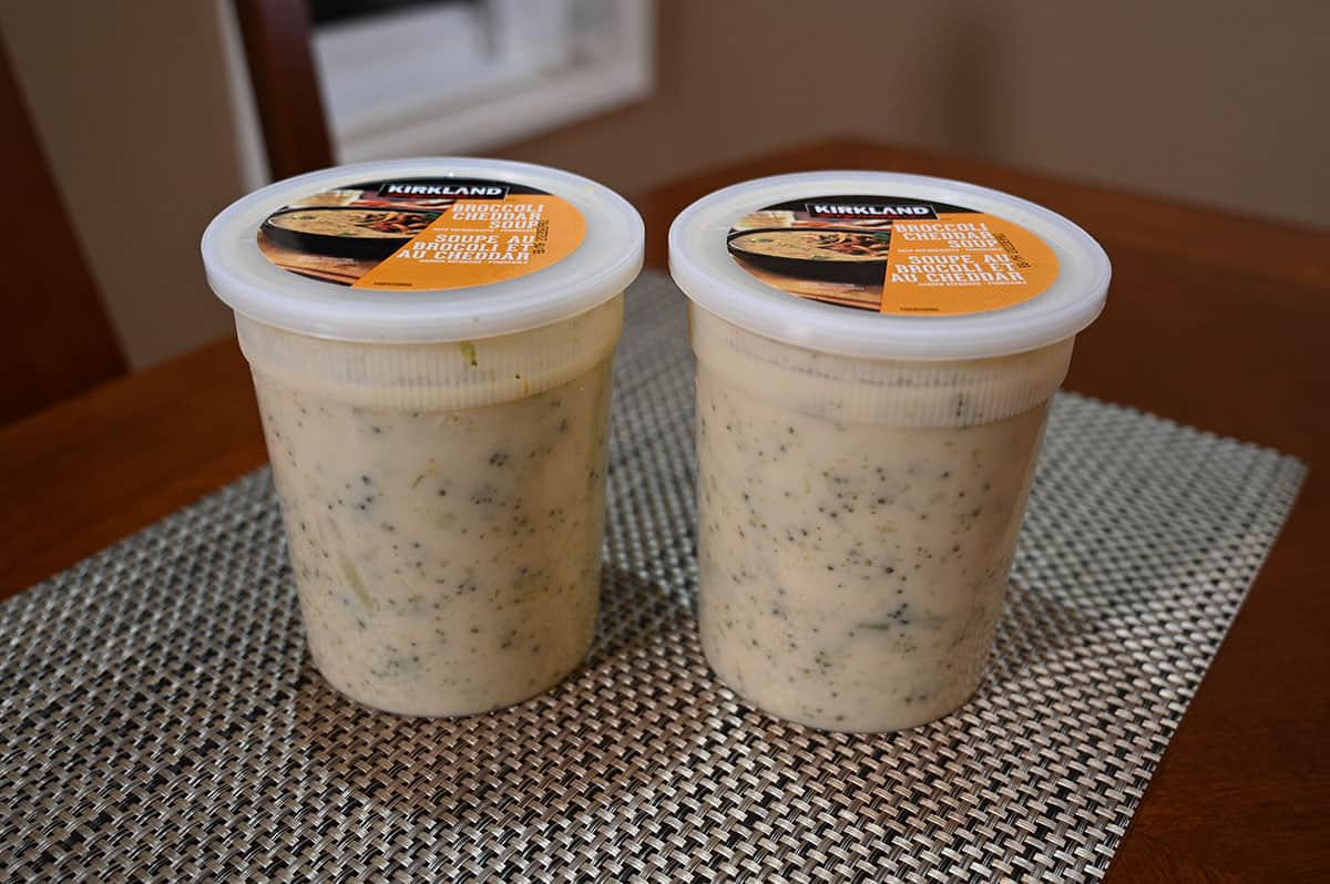 Image of two containers of the broccoli cheddar soup.