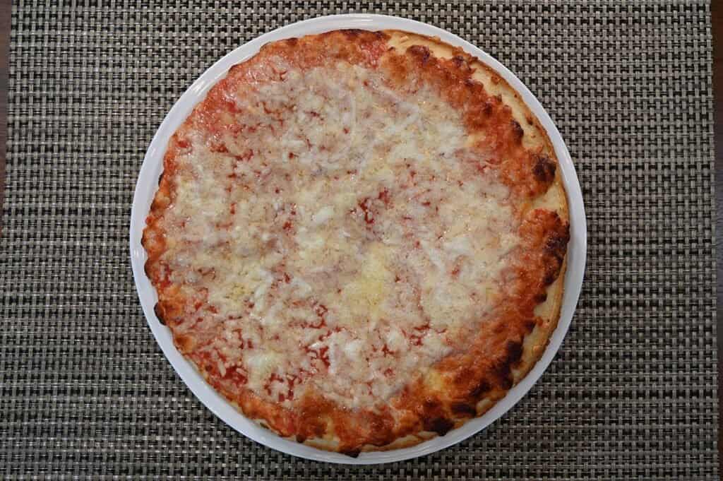 Top down image of a cooked Costco Kirkland Signature Frozen Cheese Pizza 