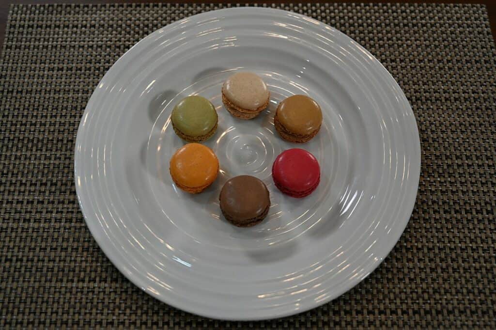 Image of all the six flavors of the Costco Tipiak French Macarons on a plate top down view