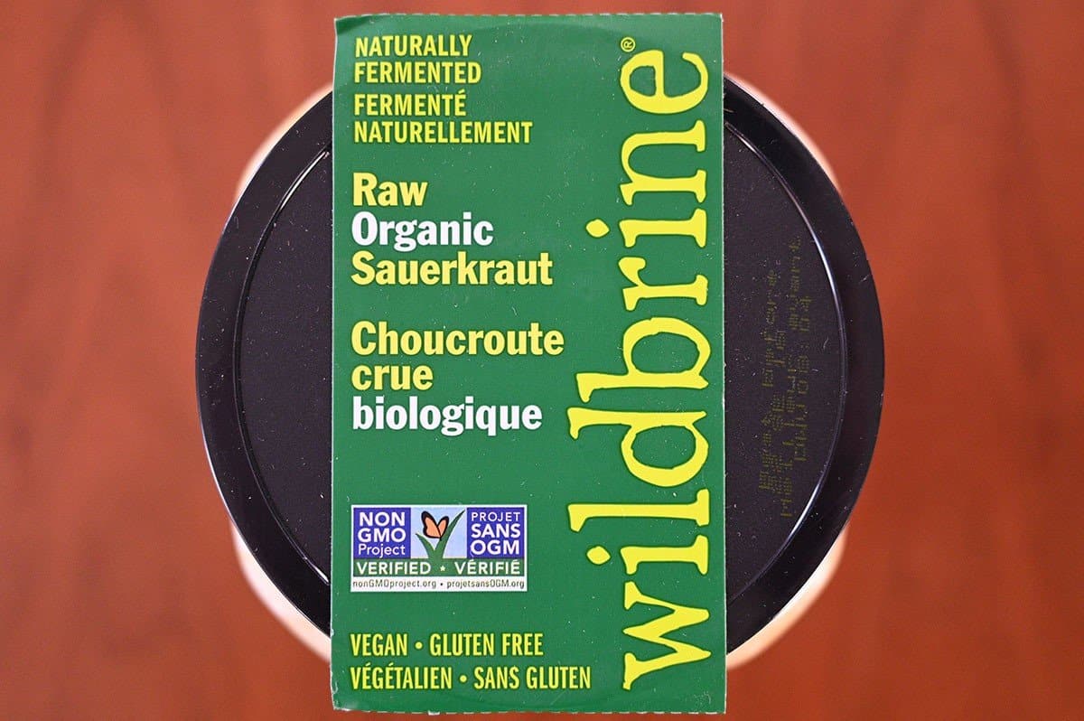 Image of the top label of the Costco Wildbrine Raw Organic Sauerkraut stating it's gluten-free and vegan. 