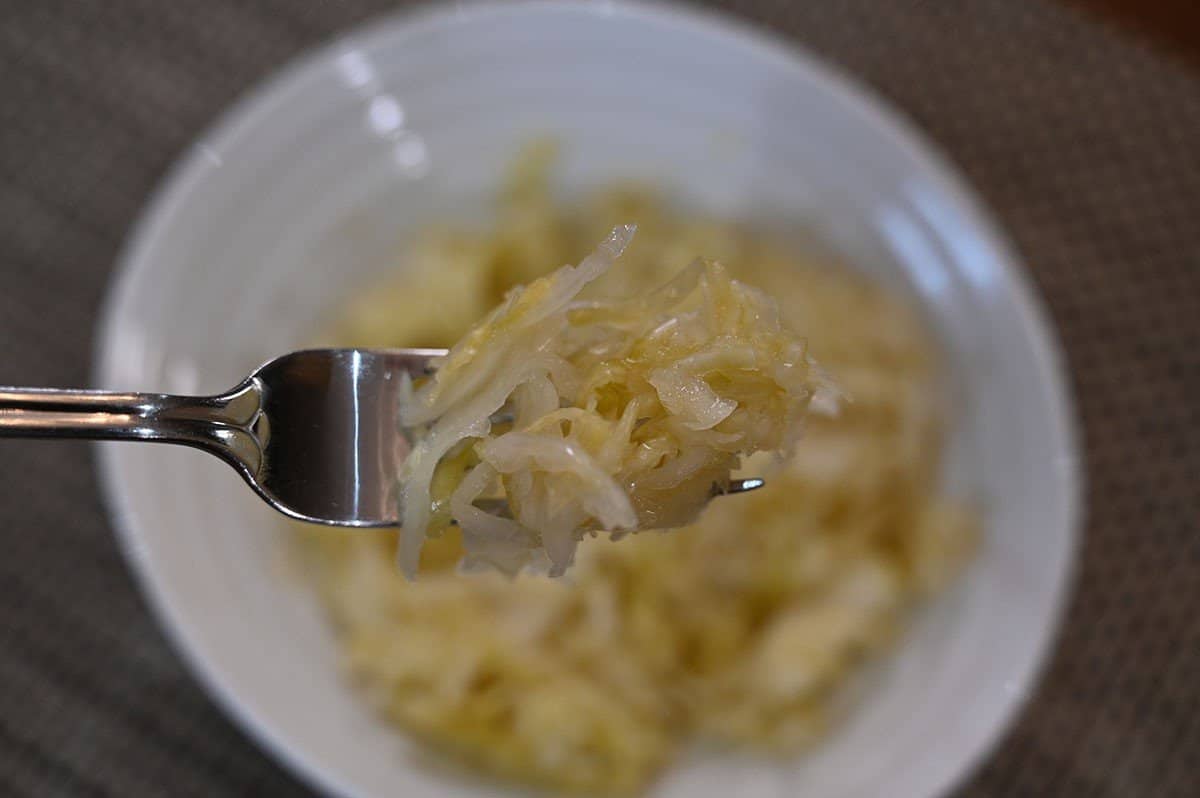 Image of the Costco Wildbrine Sauerkraut on a fork, closeup image. 