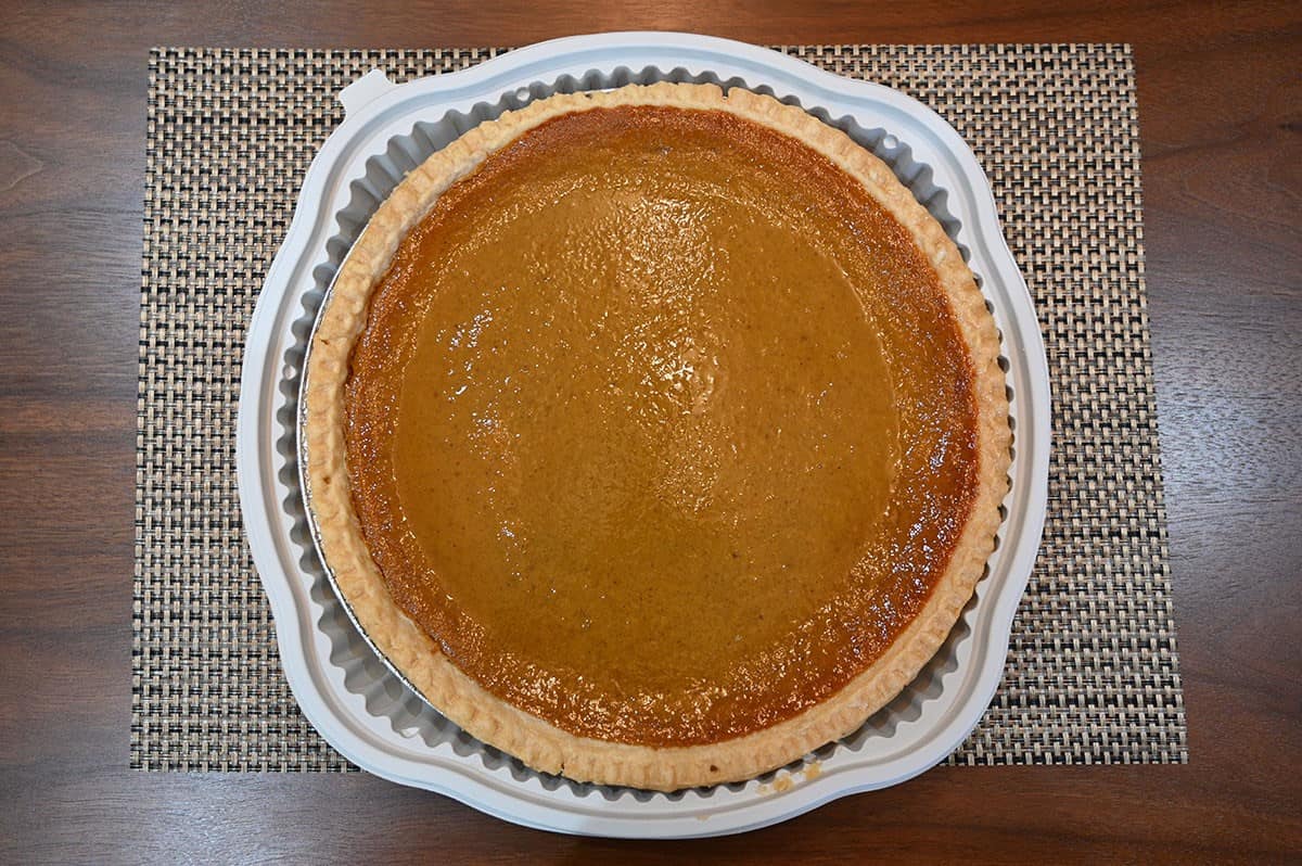 A top-down view of the Kirkland Signature Pumpkin Pie with the lid removed.