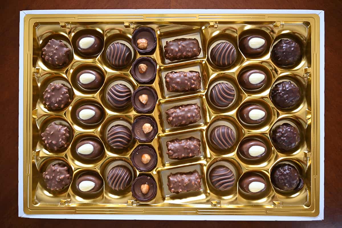 Top down image of the box of chocolates with the lid off showing all the chocolates sitting in the box.