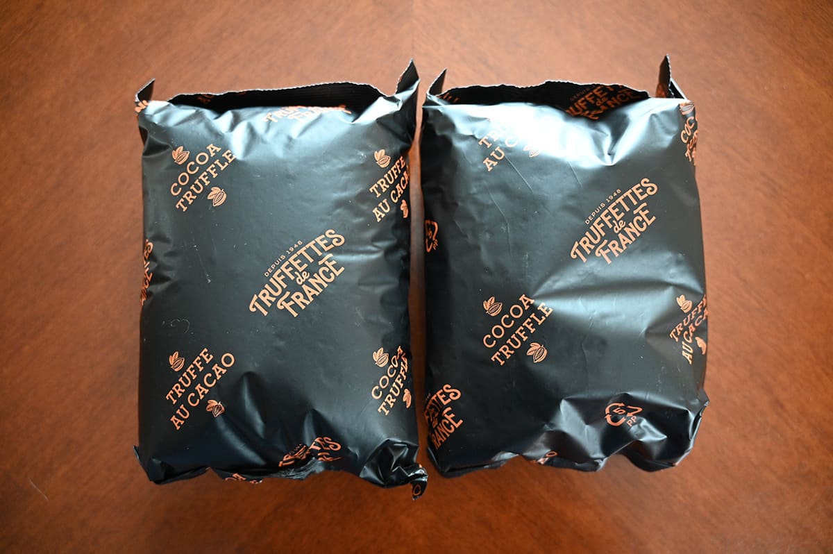 Image of two bags of truffles unopened sitting on a table.