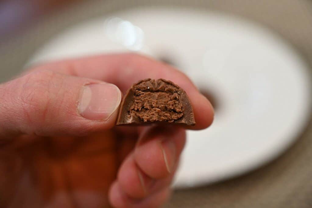 Closeup image of the Costco CHOCXO mini hedgehog showing what the inside looks like because a bite has been taken out. 