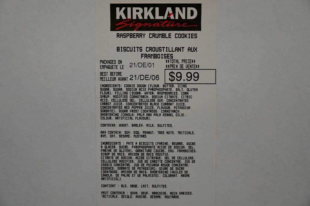 Image of a Costco Kirkland Signature Raspberry Crumble Cookie label that comes on the container with the price, best before date and ingredients. 