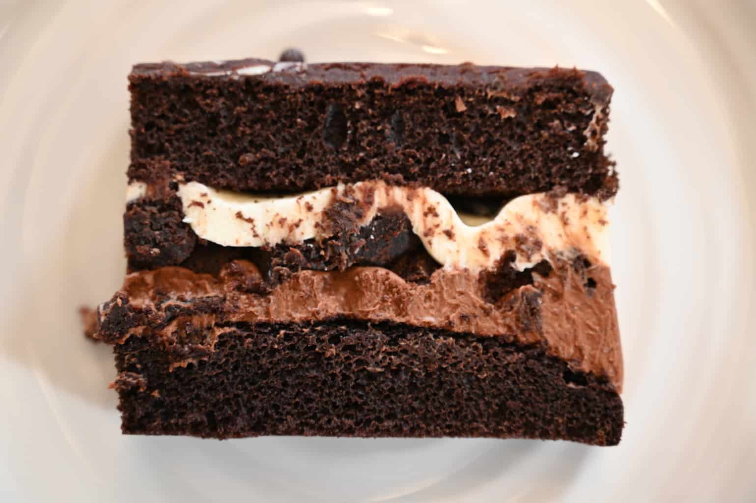 A close-up of a slice of the Kirkland Signature Tuxedo cake showing the different layers.