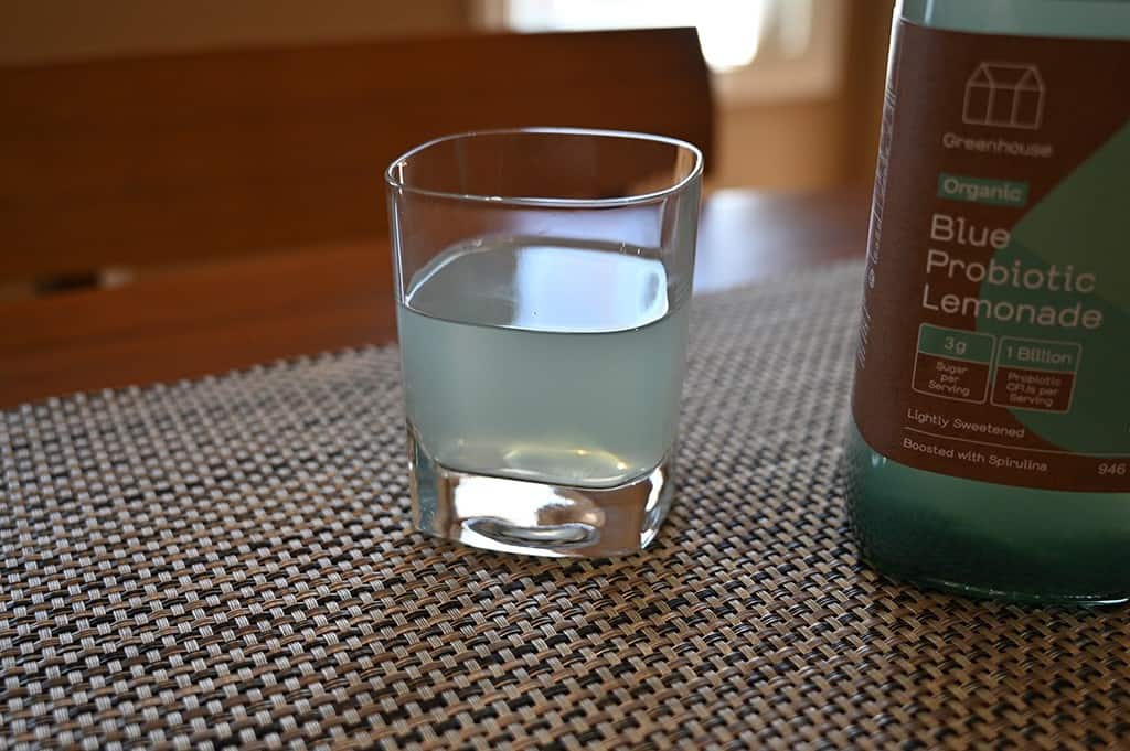 Photo of a glass of Costco Greenhouse Blue Organic Probiotic Lemonade.