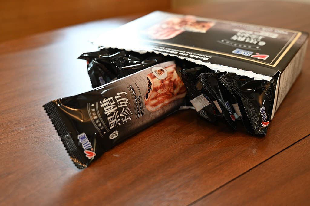 Photo of the box of brown sugar boba bars with one pulled out so that you can see the wrapper.
