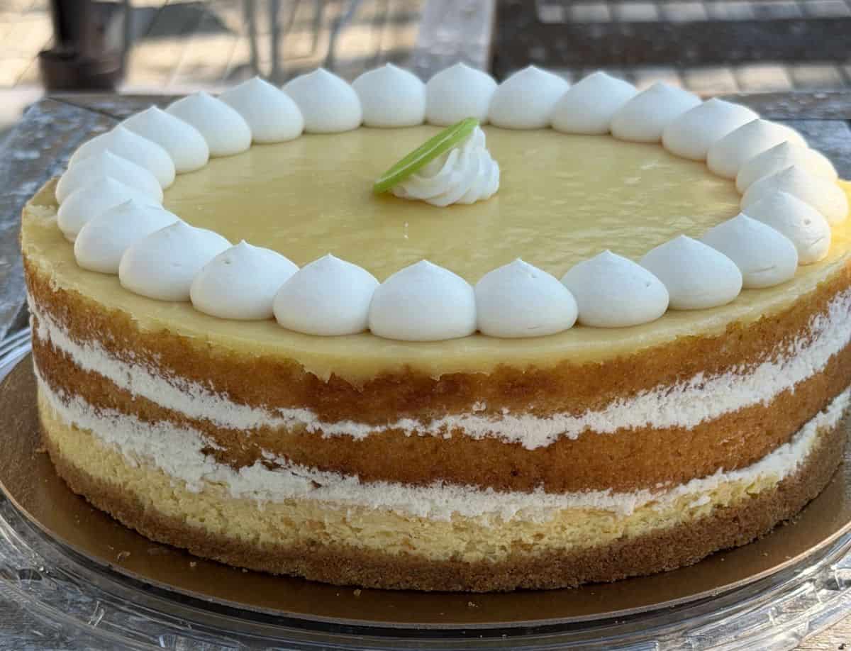 Sideview image of the Costco Kirkland Signature Key Lime Cake with the outside wrapper taken off so you can see all the layers.