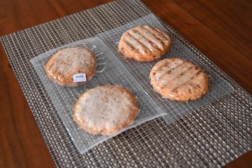 Image of the chicken burgers vacuum sealed in packs of two.