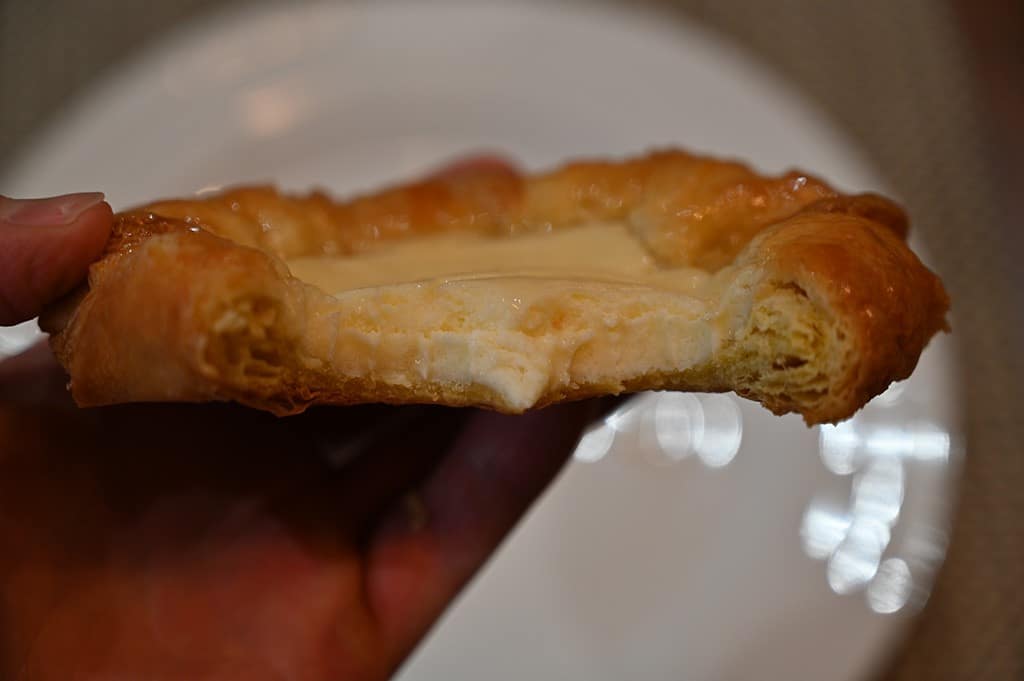 Costco Kirkland Signature Lemon Cream Cheese Danish with a bit out of it close up