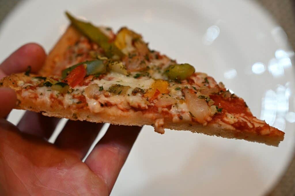 Costco Molinaro's Gluten-Free Roasted Vegetable Cauliflower Crust Frozen Pizza slice of cooked pizza