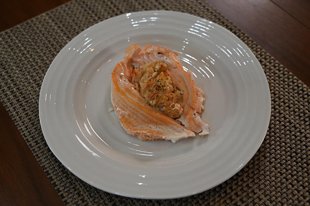 A piece of the Stuffed Salmon on a plate.