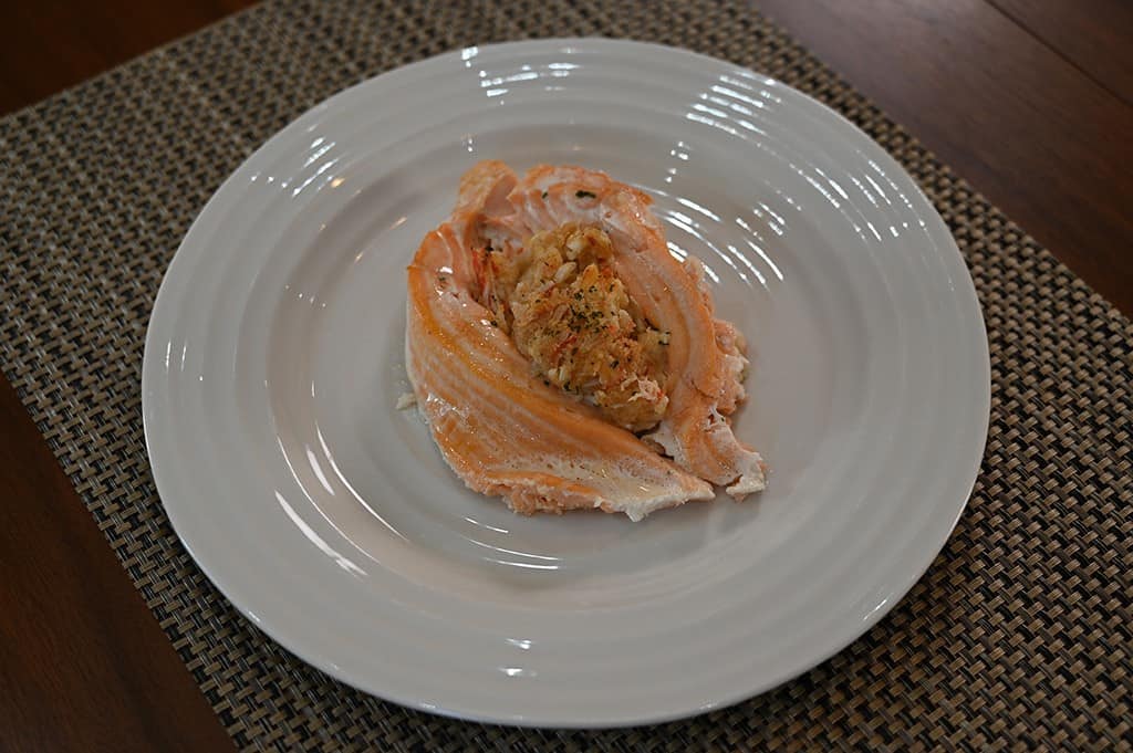 A piece of the Stuffed Salmon on a plate.