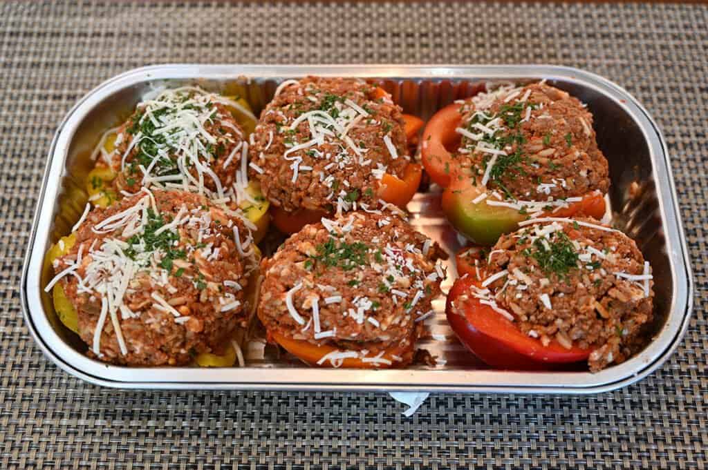 The tray of stuffed peppers with the lid removed, before cooking.