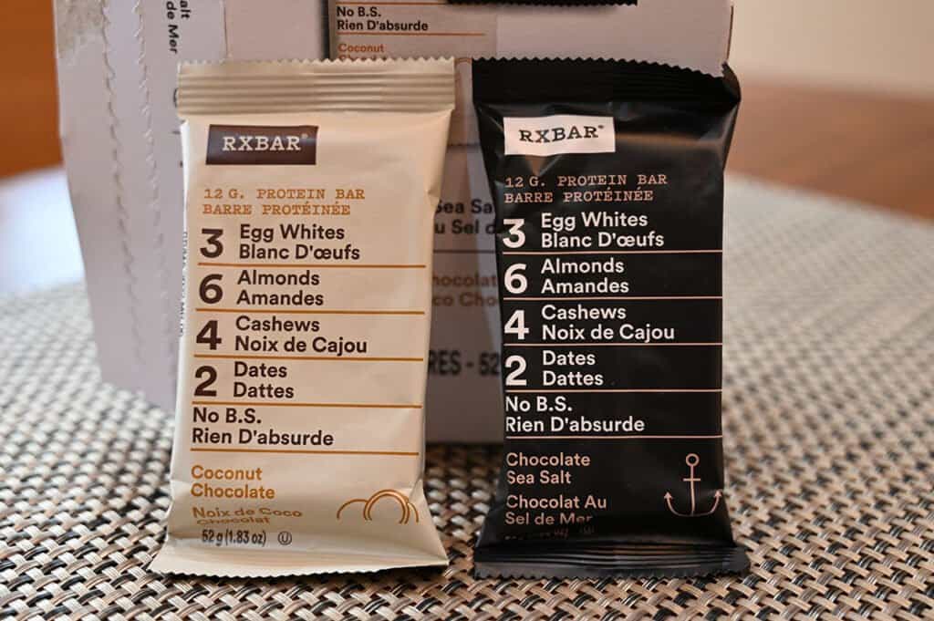 One of each of the two flavors of protein bars included in the Costco box of RXBARs - Coconut Chocolate and Chocolate Sea Salt.