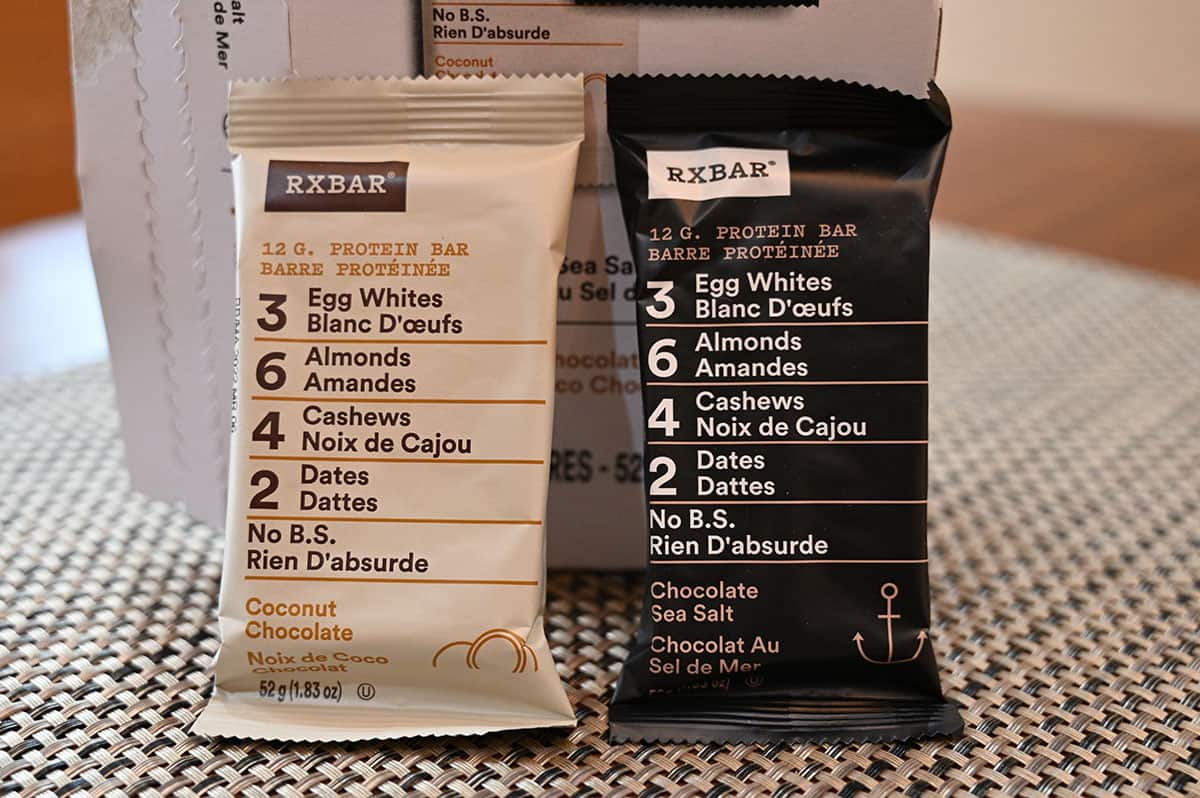 Image of one of each of the two flavors of protein bars included in the Costco box of RXBARs - Coconut Chocolate and Chocolate Sea Salt.