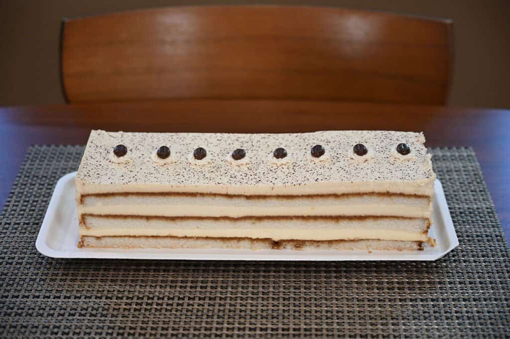 A photo of the Kirkland Signature Tiramisu Cake with the plastic cover removed.