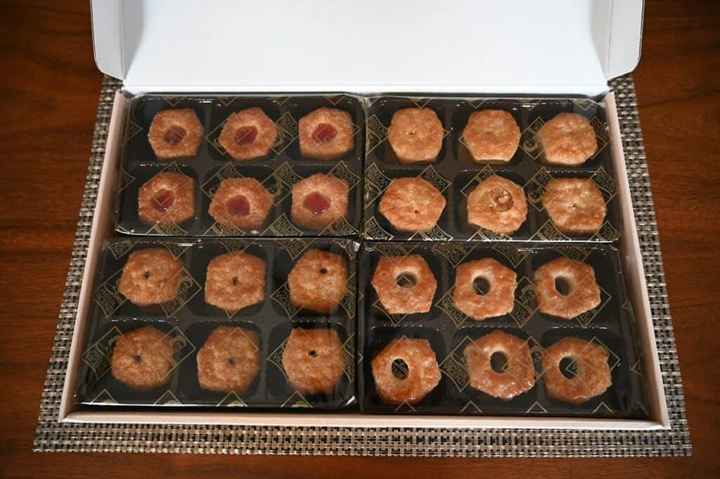 Costco Matilde Vicenzi Millefoglie D'Italia Puff Pastries in packages with box lid open to show the four seperate packages 