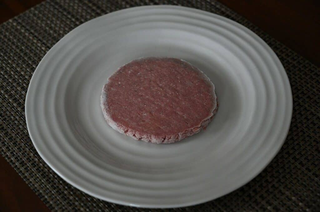 Costco Kirkland Signature Lean Ground Beef Patties uncooked, frozen pattie.