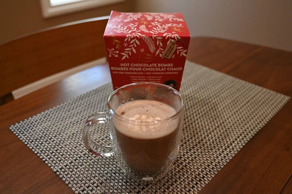 Costco Deavas Hot Chocolate Bombs hot chocolate in a mug in front of the box