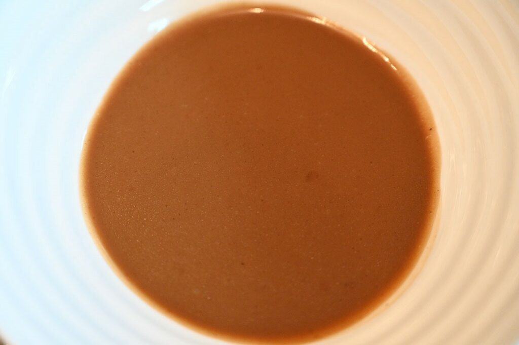 Costco Johnny's Black Garlic Vinaigrette  poured in a bowl