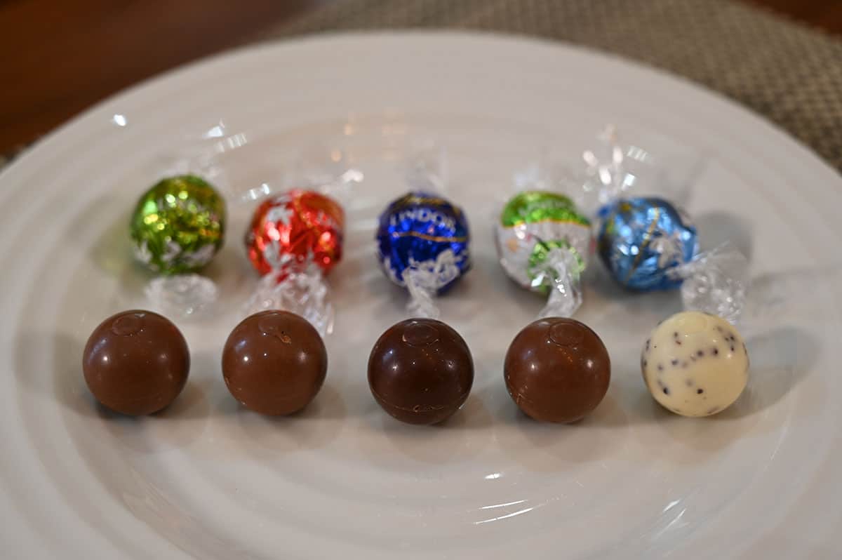 Image of the five different Easter limited edition box lindor chocolates out of the wrapper and on a white plate.