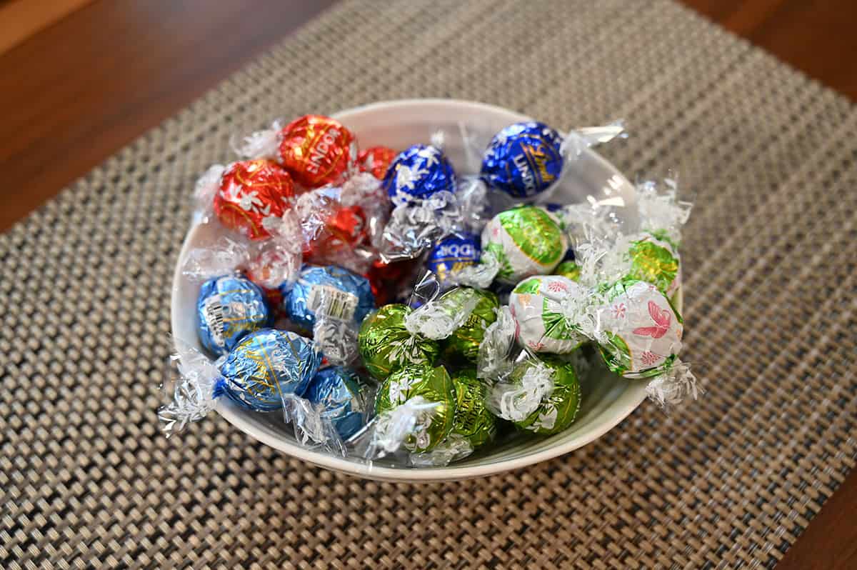Image of the limited edition Easter box chocolates poured into a white bowl still with wrappers on.