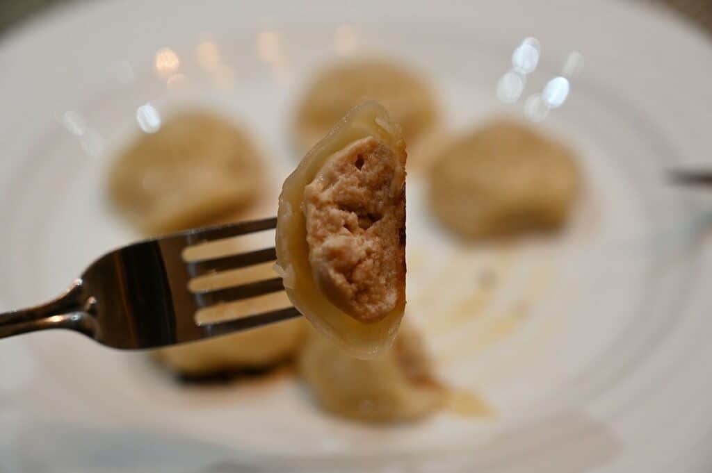 Costco Synear Soup Dumplings cooked and cut in half close up image
