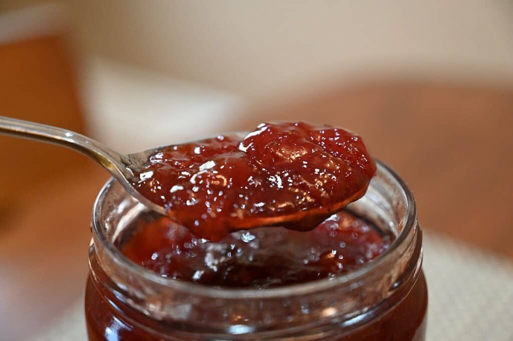 Costco Bonne Maman Strawberry Jam closeup photo of a spoon of jam 
