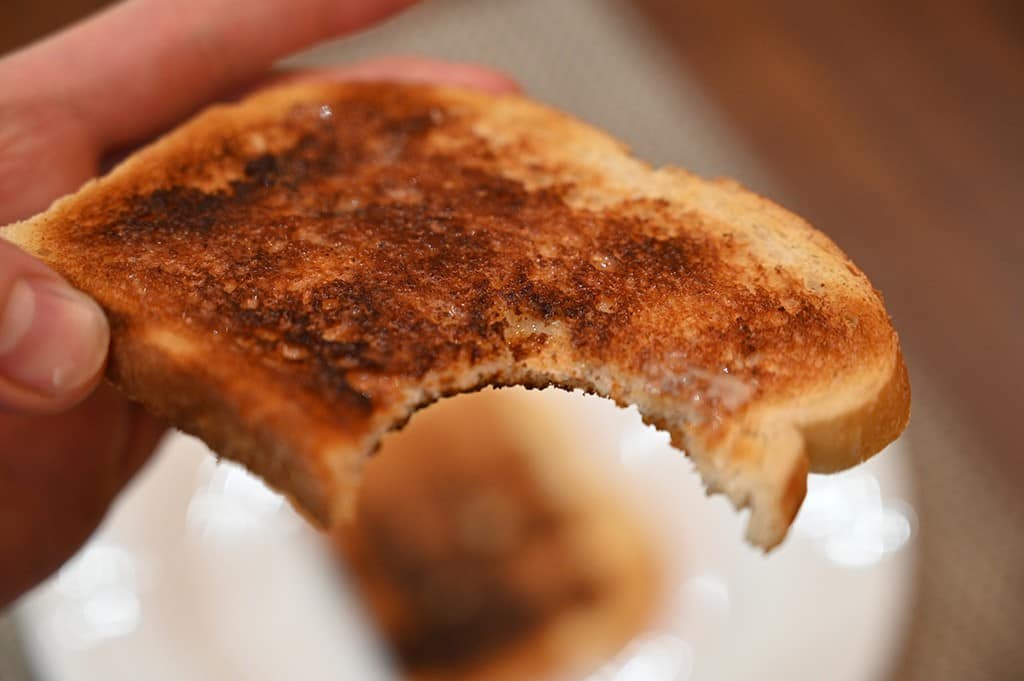 Costco Vero Vero Heritage Sourdough Bread closeup of a toasted slice with a bite taken out of it