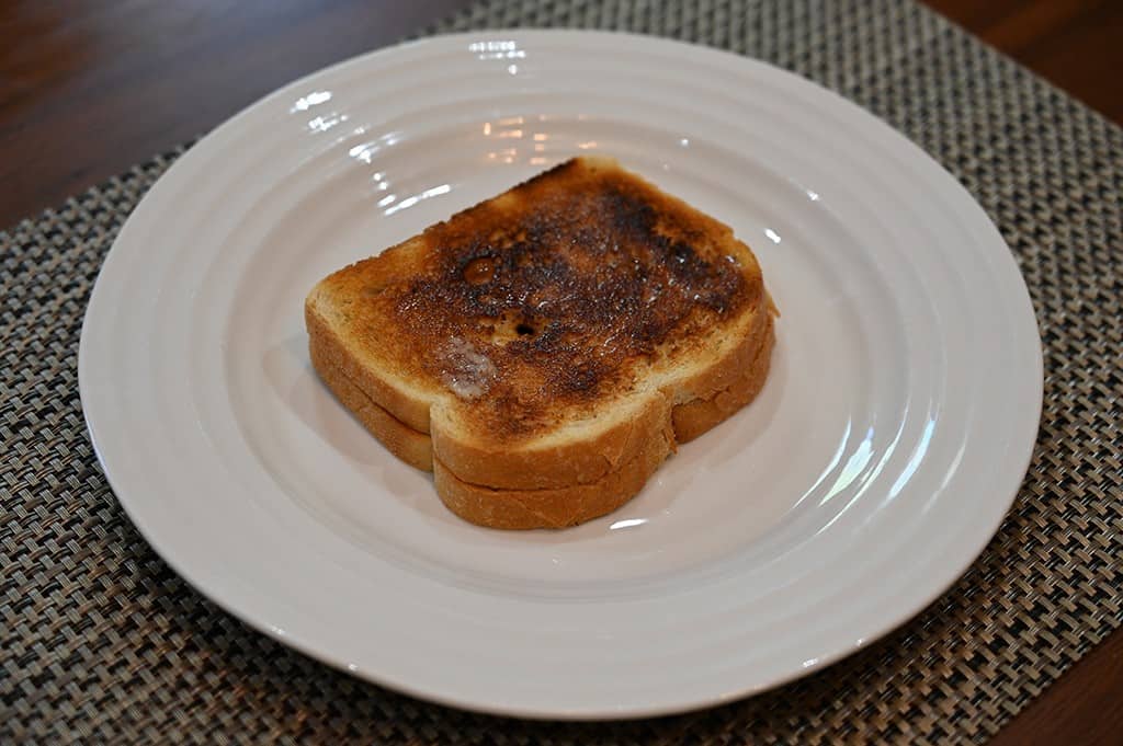 Costco Vero Vero Heritage Sourdough Bread - two slices of toasted and buttered sourdough on a plate 