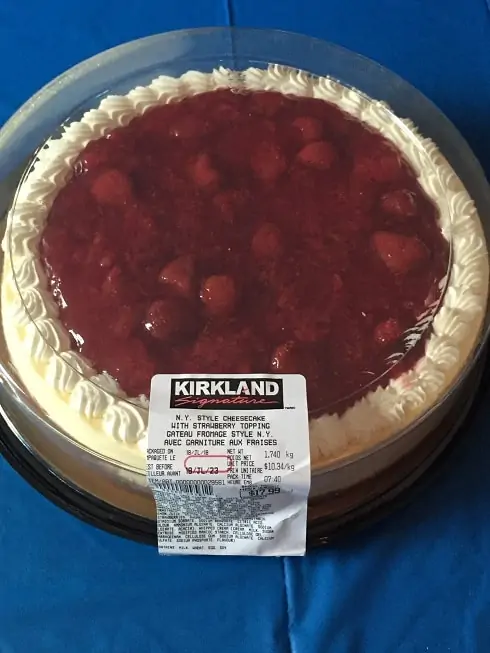 A top-down photo of the Kirkland Signature New York Style Cheesecake with Strawberry Topping.