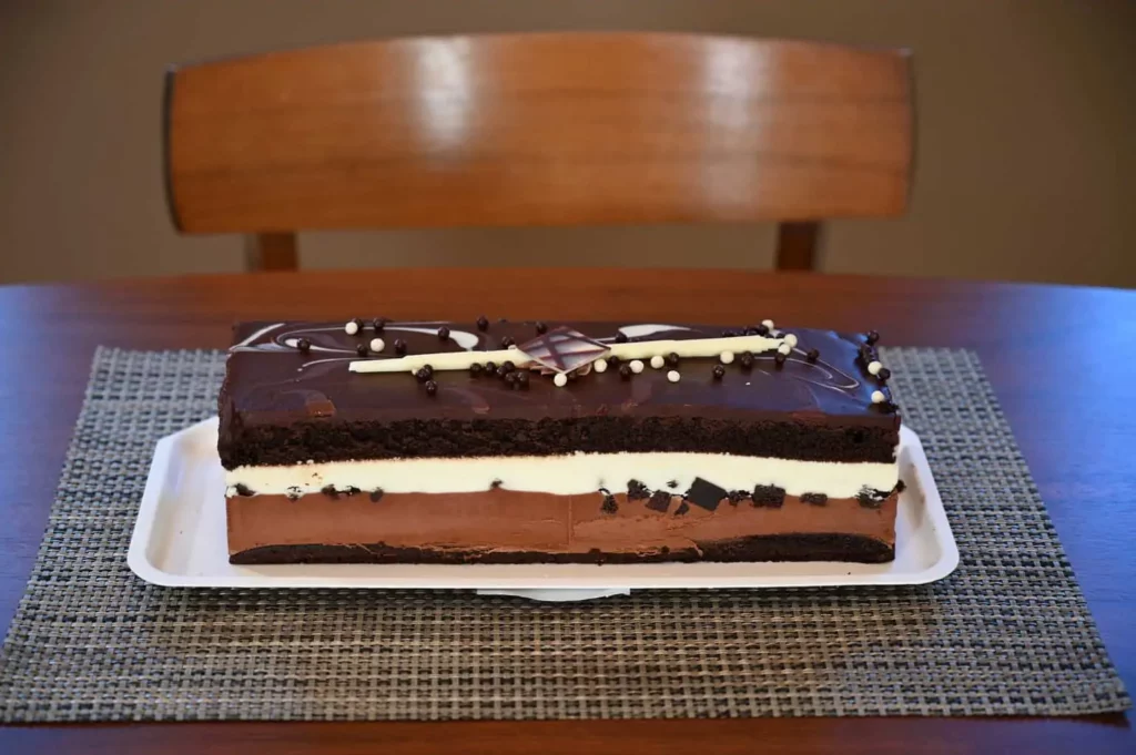 A photo of the Kirkland Signature Tuxedo Cake with the plastic cover removed.